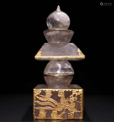 A CHINESE
CRYSTAL COVERD GOLD STUPA
