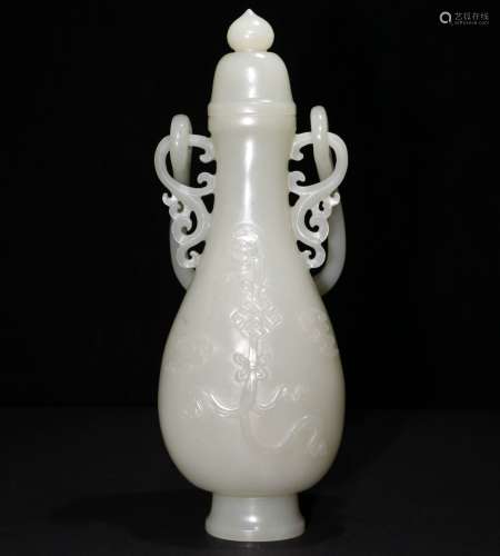A CHINESE CARVED HETIAN JADE BOTTLE