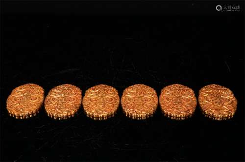 A CHINESE GILTING BRONZE TIM TOKEN SET