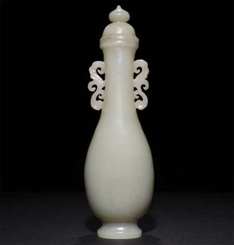A CHINESE CARVED HETIAN JADE BOTTLE