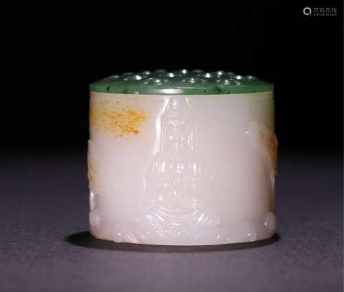 A CHINESE CARVED HETIAN JADE THUMB RING