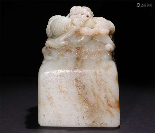 A CHINESE CARVED HETIAN JADE SEAL