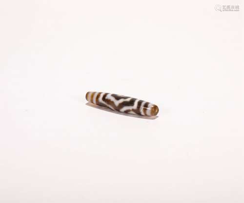 AN ANCIENT THREE EYES PATTERN DZI BEAD