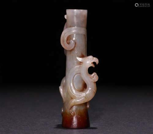 A CHINESE CARVED WHITE JADE ORNAMENT