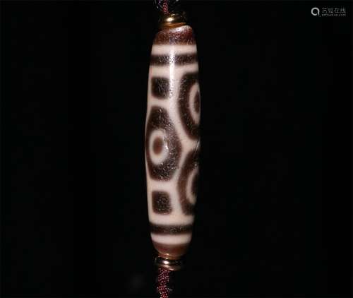 AN ANCIENT SIX EYES PATTERN DZI BEAD