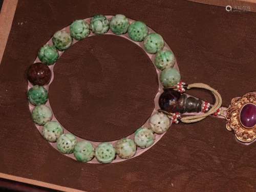A Chinese Floral Jadeite Beads Hand String