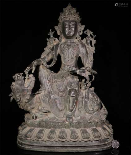 A CHINESE BRONZE 
MANJUSHRI STATUE