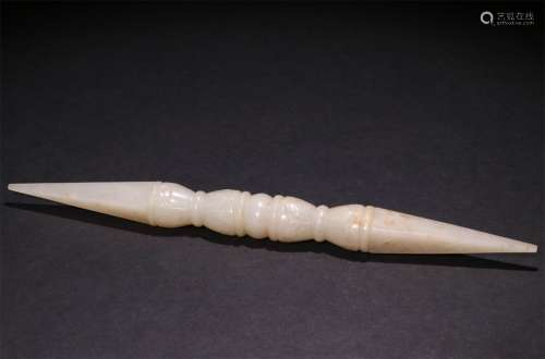 A CHINESE CARVED WHITE JADE INSTRUMENT