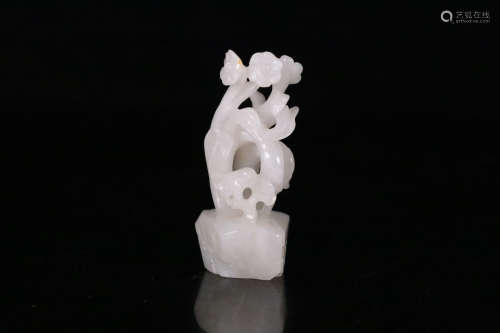 A Chinese Carved Hetian Jade Flower Ornament