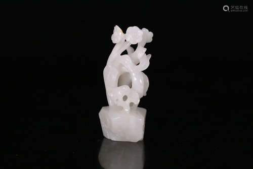 A Chinese Carved Hetian Jade Flower Ornament