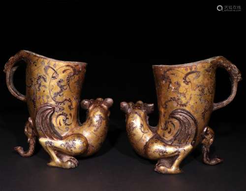 A PAIR OFCHINESE SILVER MIXED GOLD ZUN CUPS