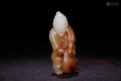 A Chinese Carved Hetian Jade Fisherman Ornament