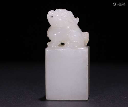 A CHINESE CARVED HETIAN JADE SEAL