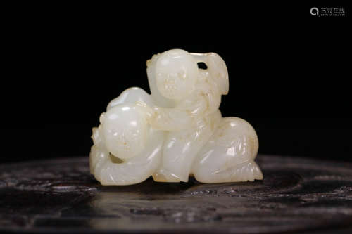 A Chinese Carved Hetian Jade Boy Ornament