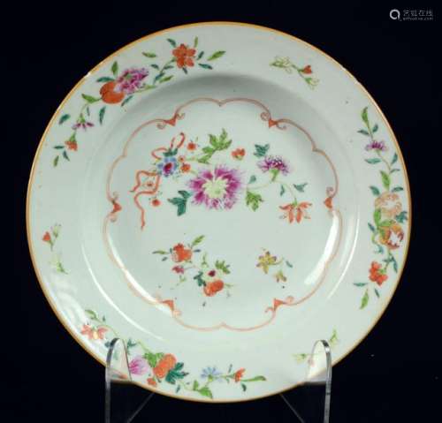 A Chinese famille rose soup plate with flowers and…
