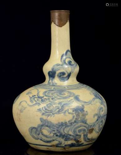 An Oriental blue painted vase with a brass neck, A…