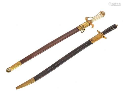 Set of two hunting daggers One mounted in bronze w…