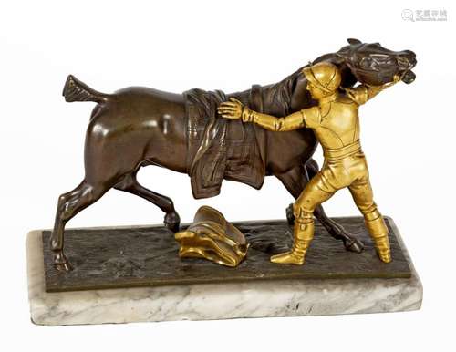 Jockey and his horse Bronze with brown patina and …