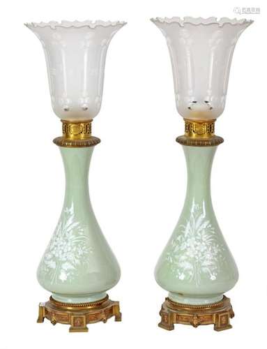 Pair of electrified oil lamps in green celadon por…