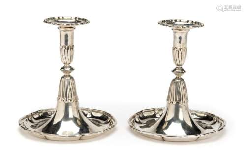 A pair of German silver trumpet candlesticks