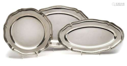 Three silver serving dishes