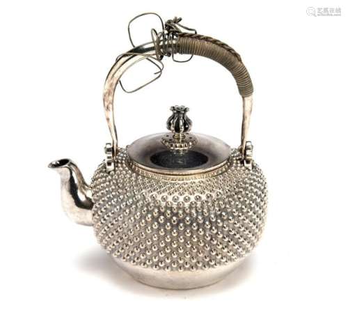A Japanese silver tea pot