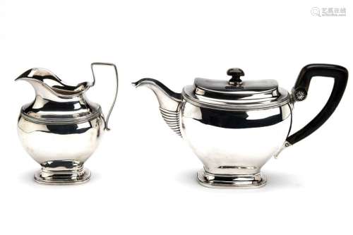 A Dutch silver teapot and milk jug