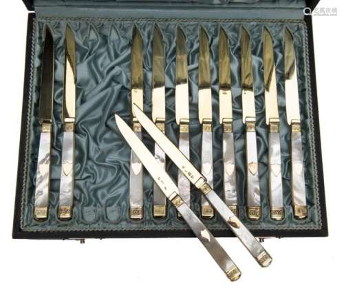 A fine set of twelve Dutch silver and gilt knives …