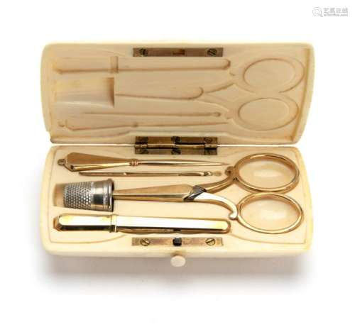 A 14K sewing set in ivory case