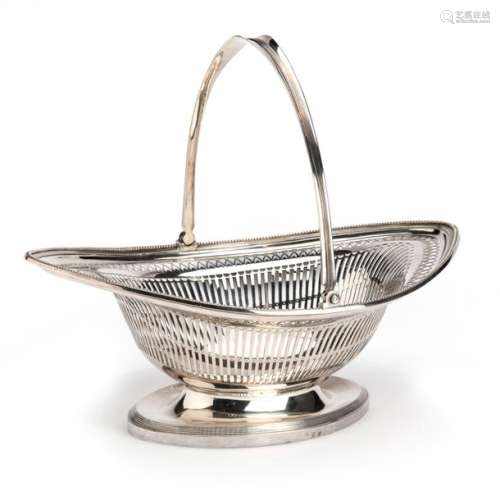 A Dutch silver cake basket with swing handle