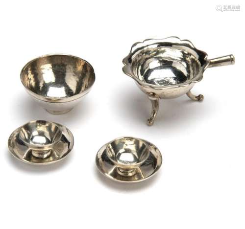 A Dutch silver miniature bowl, two cups and saucer…