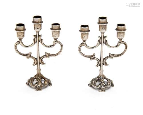 Two Dutch silver miniature three light candelabras