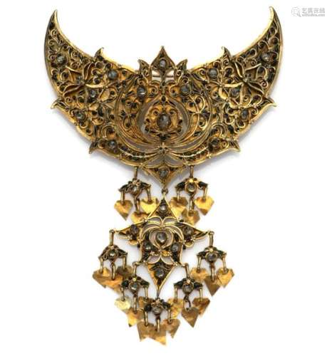 An Oriental 14k gold brooch ornament