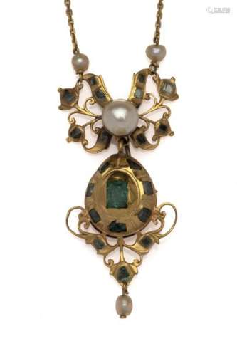 An antique emerald pendant on chain