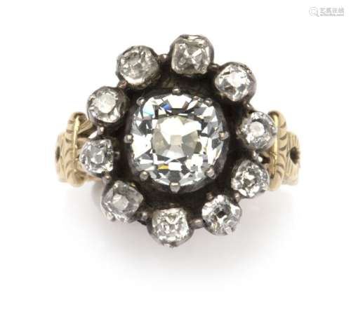 A 14k gold and silver diamond ring