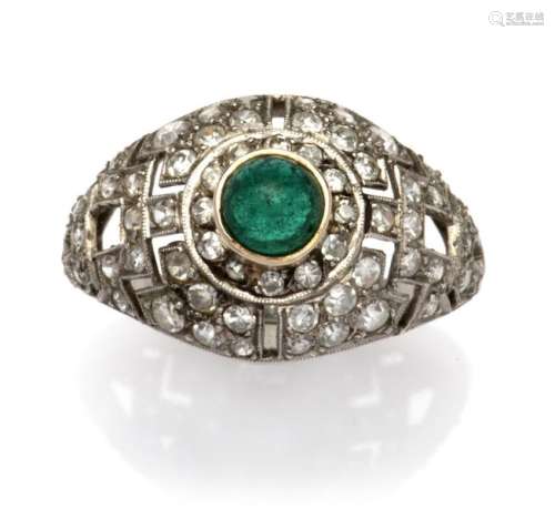 A platinum Art Deco emerald and diamond ring