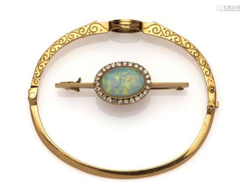 An antique 18k gold opal and diamond jewel