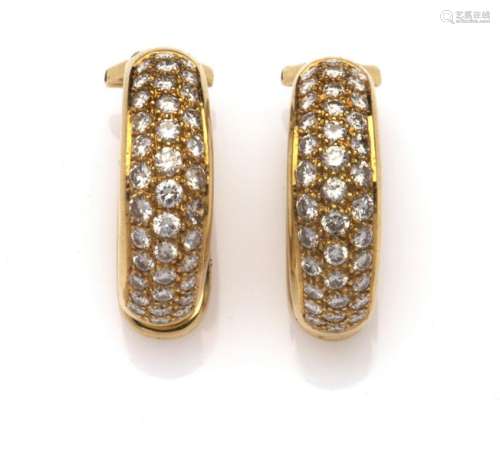 A pair of 18k gold diamond earclips