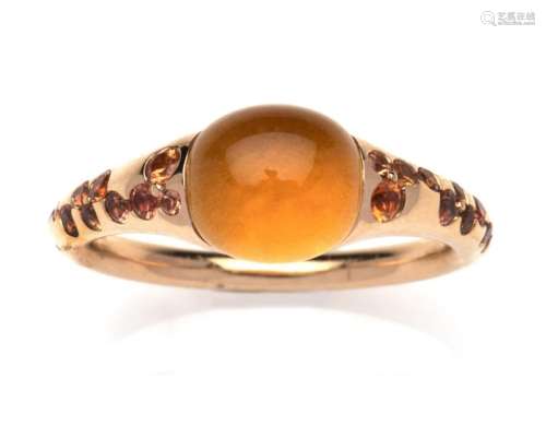 An 18k pink gold gem set ring