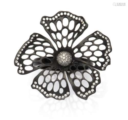A titanium and diamond flower ring