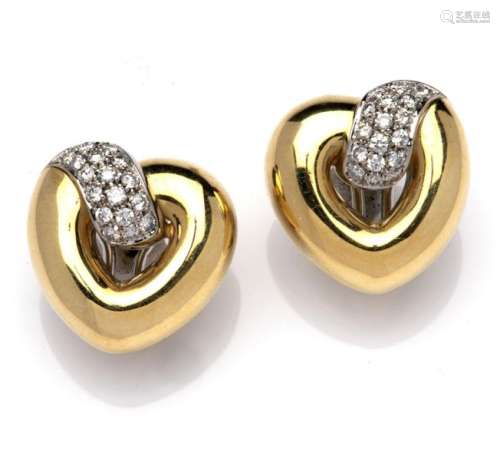 A pair of 18k gold diamond earclips, by Leo Pizzo