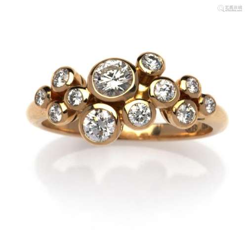 An 18k gold diamond ring