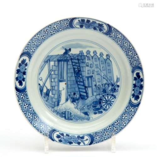 A blue and white plate depicting the \