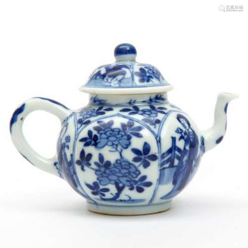 A miniature blue and white Long Eliza teapot