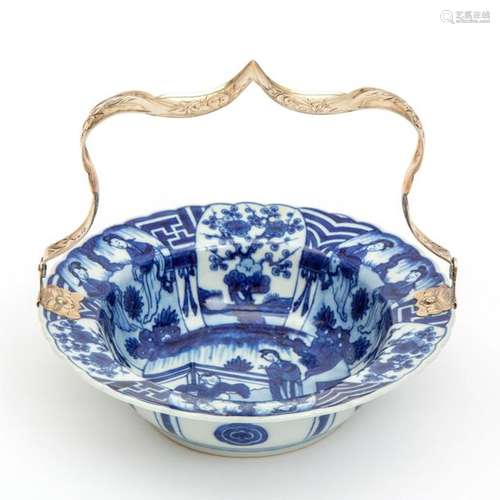 A blue and white Long Eliza bowl with silver handl…