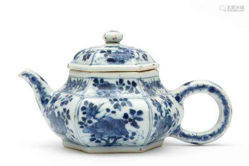 A blue and white floral teapot