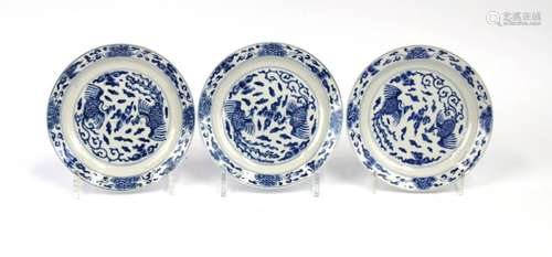 Three small size blue and white plates.