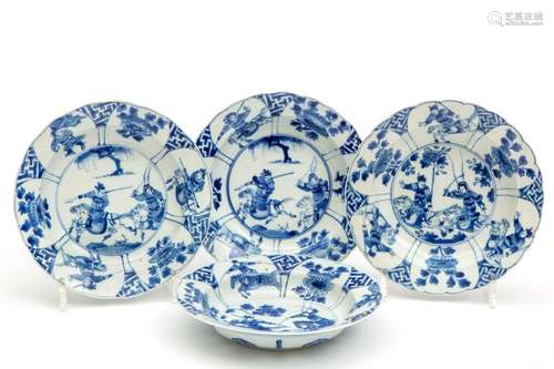 Four blue and white deep plates with warriors on h…