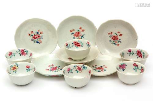 Six famille rose flower shaped cups and saucers