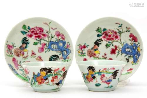 Two famille rose cockerel cups and saucers